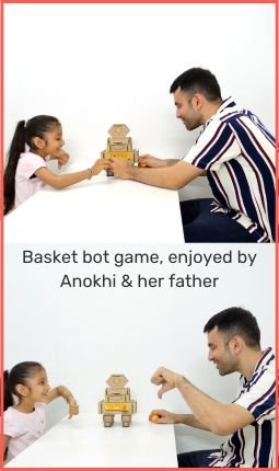 kid with father playing basket bot game