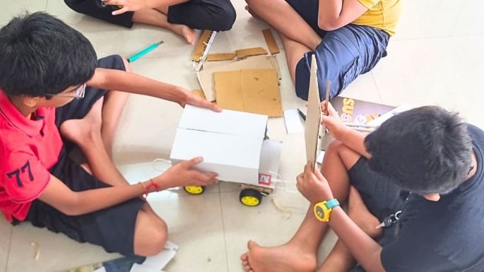 group of boys doing craft project